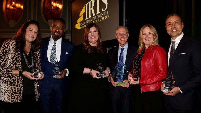 The honorees for the 2019 IRTS Hall of Mentorship standing together with their awards